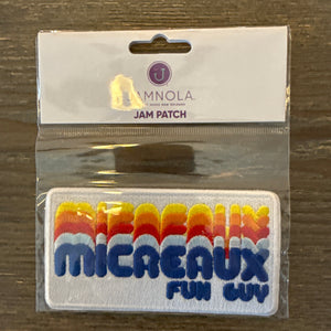 Embroidered Patch that says Micreaux  Fun Guy in stacked letters