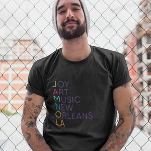 Black JAMNOLA Signature Unisex Tee Shirt with JOY ART MUSIC NEW ORLEANS in multi color lettering