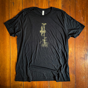 Black Unisex Roots of Music Charity Tee Shirt with gold trumpet with roots growing out of it 