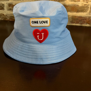 Back of powder Blue Bucket hat with one love and red heart patch