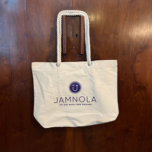 Back of the Sunshine tote with the JAMNOLA wink logo and the words Joy Art Music New Orleans