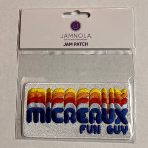 Embroidered patch with colorful text that says Micreaux Fun Guy.