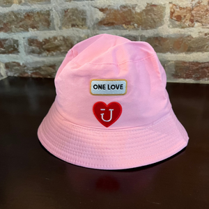 Back of pastel pink Bucket hat with one love and red heart patch