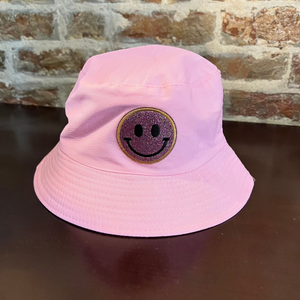 Pastel Pink bucket hat with sparkley smiley face