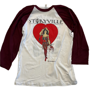 Maroon and white three quarter sleeve baseball t-shirt with 'Storyville' text and a graphic of a woman in front, and 'Rising Sun' text on the back.